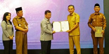 Wakil Bupati Muaro Jambi, Junaidi H. Mahir, Terima Sertifikat Kekayaan Intelektual Komunal (KIK) Atas Pencatatan Ciptaan Seni Ekspresi Budaya Tradisional
